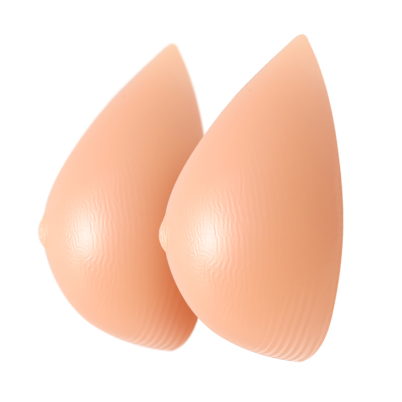 Our Silicone Detachable Breast Prosthesis is designed to deliver a highly realistic appearance and natural feel, making it an ideal solution for crossdressers, performers, cosplay enthusiasts, and individuals seeking body enhancement. Crafted from premium medical-grade silicone, it mimics the softness, weight, and movement of natural breasts, ensuring both visual authenticity and physical comfort.