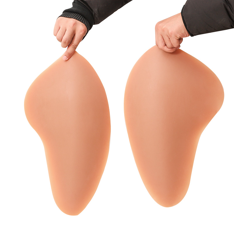 Designed for those who pursue the perfect hourglass silhouette, these premium silicone hip pads offer a realistic and comfortable solution. Crafted from high-elasticity, medical-grade silicone, they feature a lifelike skin texture that mimics natural tissue. Their unique bionic design contours perfectly to your body, providing natural side-fill that effectively corrects flat hips. They are the ideal choice for enhancing your silhouette under tight dresses, traditional garments, or evening gowns.